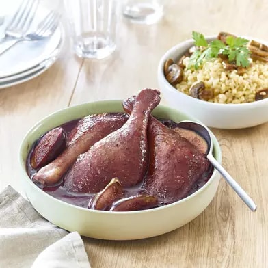 Cuisses de canard aux figues, blé et champignons sautés